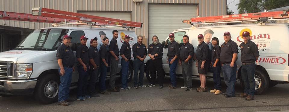 Conan Heating and Air Conditioning Staff and Trucks